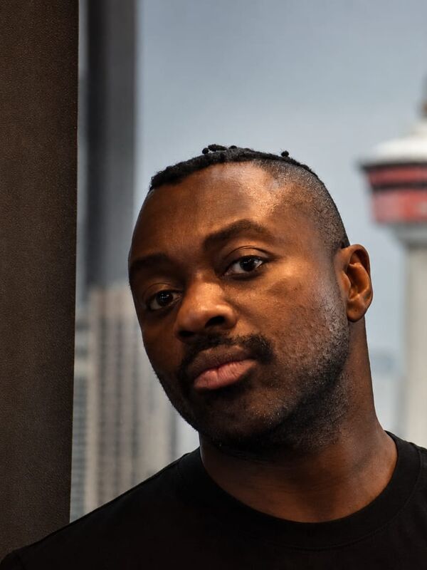Action Jackson with the Calgary Tower behind him